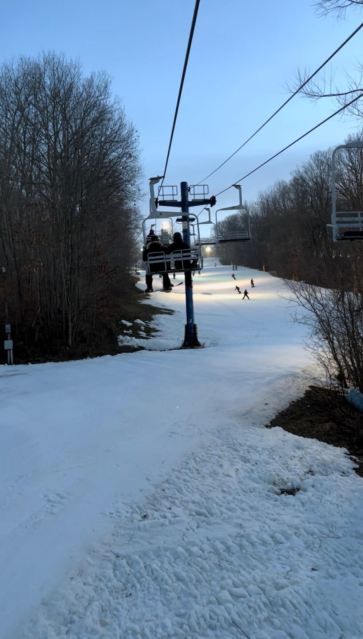 Going up the hill for snowboarding